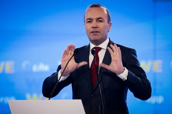 Ο Βέμπερ ανταποδίδει τη στήριξη στον Μητσοτάκη