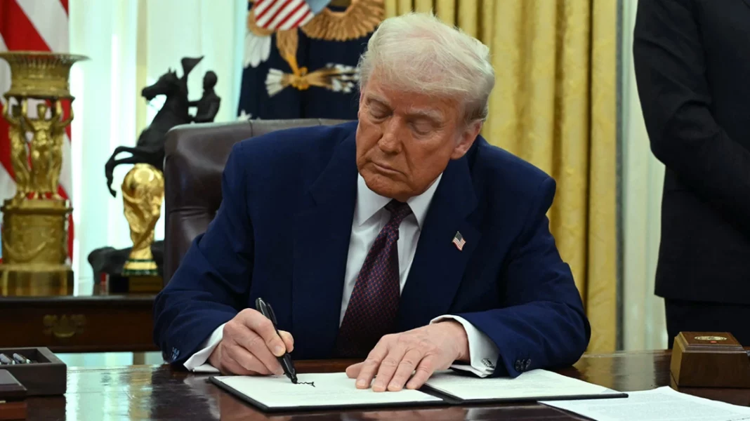 trump_signing-afp-xrwma