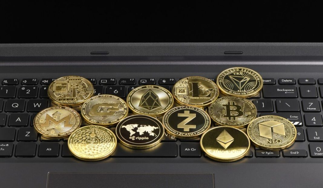 Golden,Cryptocurrency,On,Keyboard,Laptop,,Bitcoin,,,Ethereum,,Litecoin,,Dashcoin,