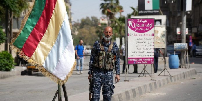 AFP__20250429__43XD7KF__v7__HighRes__SyriaConflict-e1752854437891-696x348