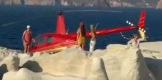Kράτος για γέλια: Ελικόπτερο προσγειώθηκε ανάμεσα σε εκατοντάδες λουόμενους στο Σαρακήνικο για να πάνε οι επιβάτες του για μπάνιο!
